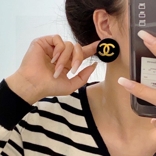 Chanel Black 18K Yellow Gold Earrings