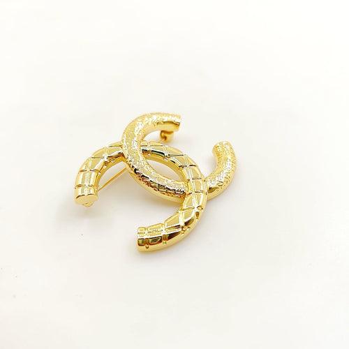 Chanel 24S 18K Gold Brooch
