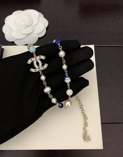 Chanel Blue & White Pearls 18K Gold Necklace