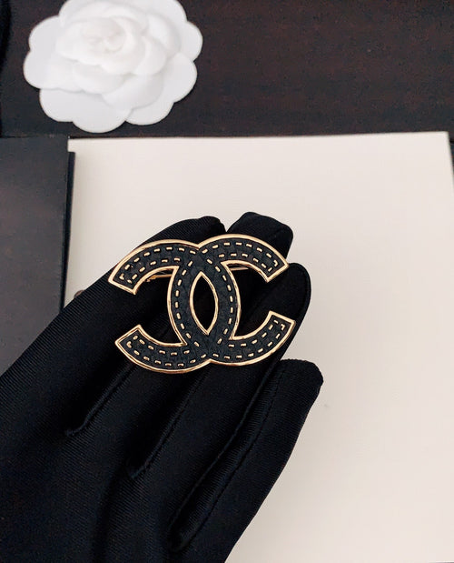 Chanel Black 18K Gold Brooch